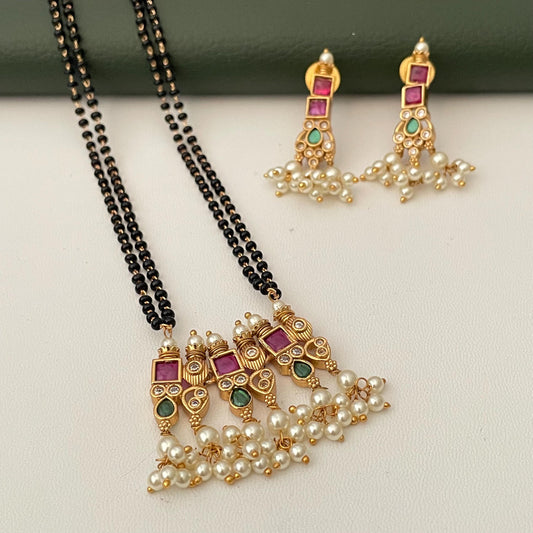 Gold Plated Tanmani Mangalsutra Set: Black Beads, Ruby green Pendant
