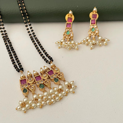 Gold Plated Tanmani Mangalsutra Set: Black Beads, Ruby green Pendant