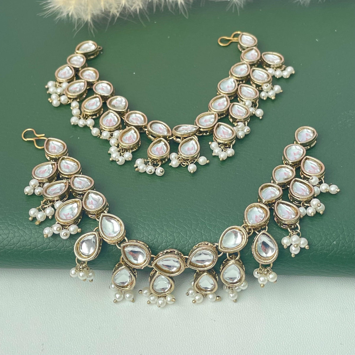 kundan and pearl gold plated ear chain