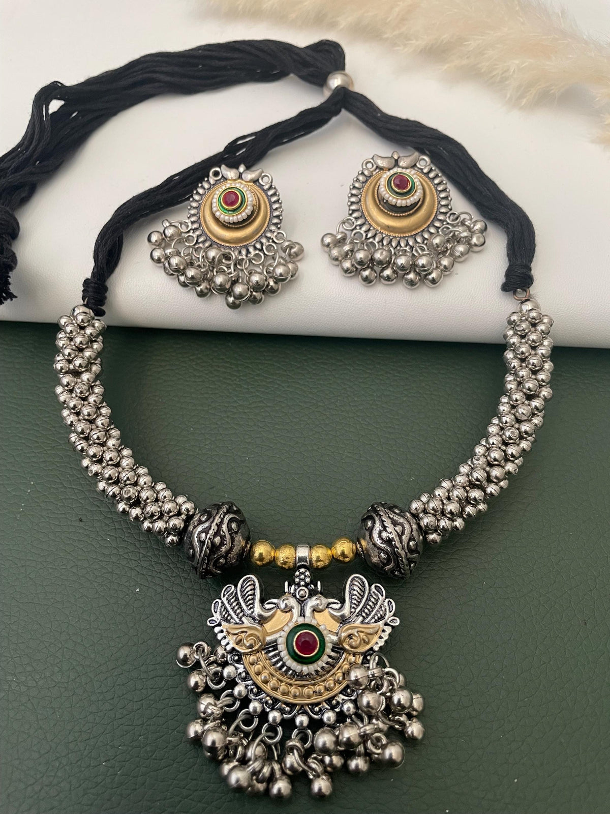 Dual tone Oxidised small pendent fancy thushi / hasli with matching jhumkis