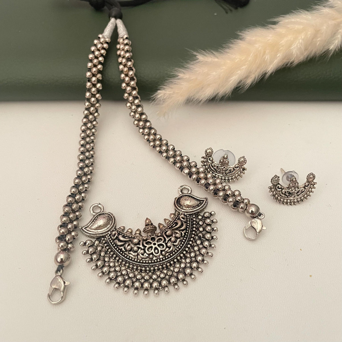 Fancy Oxidised thushi with changeable pendants and matching small earrings