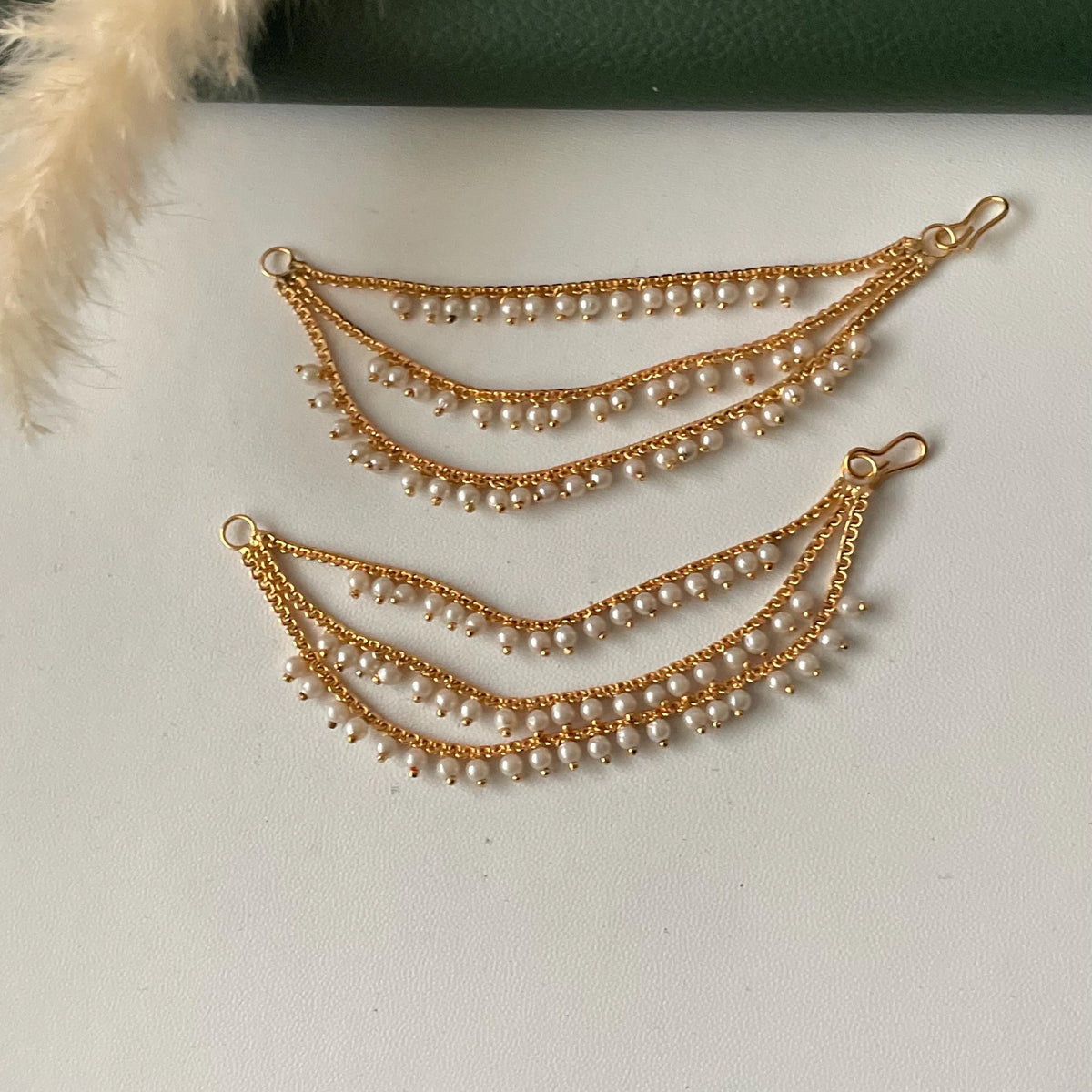 Pearl and golden three layered earchain