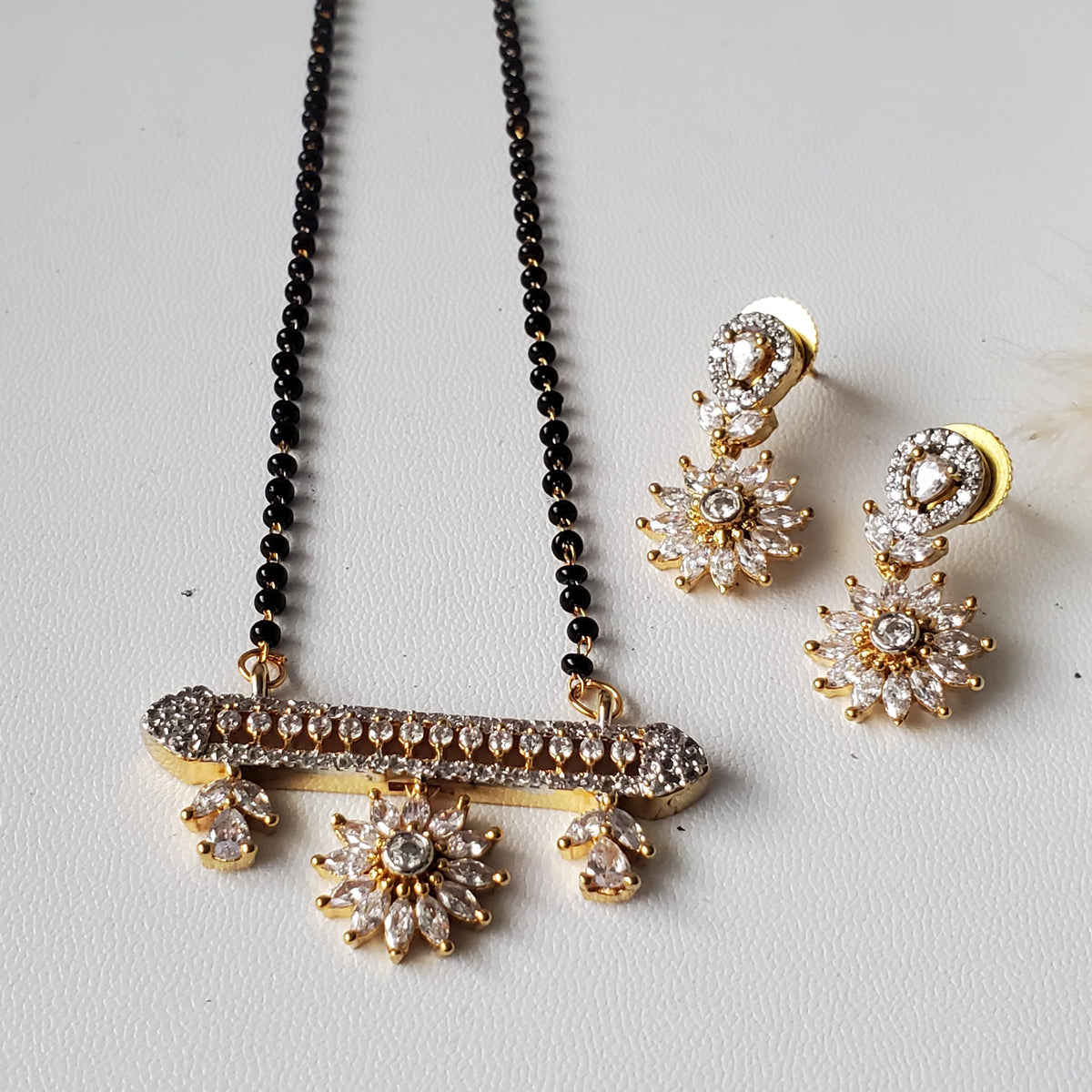 CZ pendant gold plated black beaded Mangalsutra with earrings