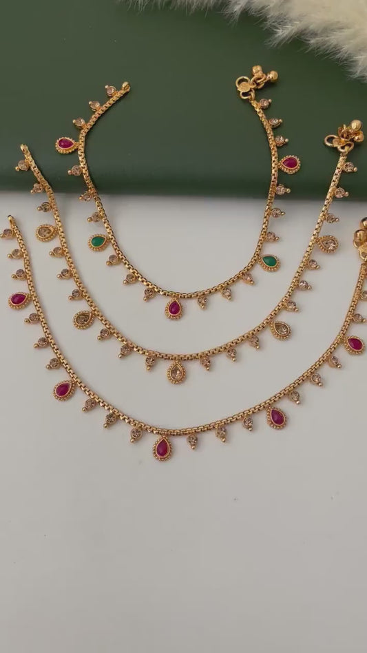 Gold plated bridal payal anklets in Ruby Green and lct