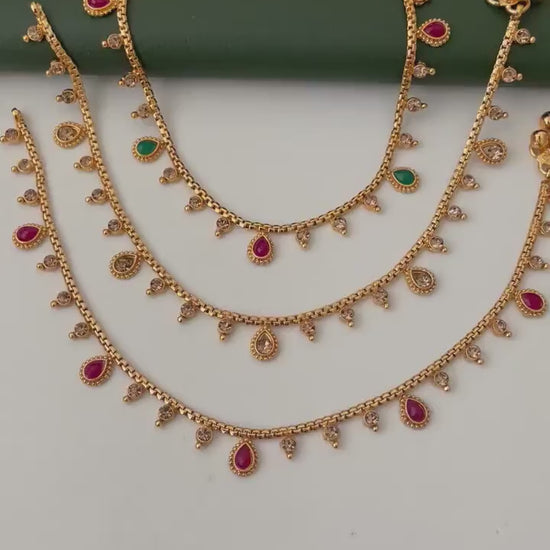 Gold plated bridal payal anklets in Ruby Green and lct