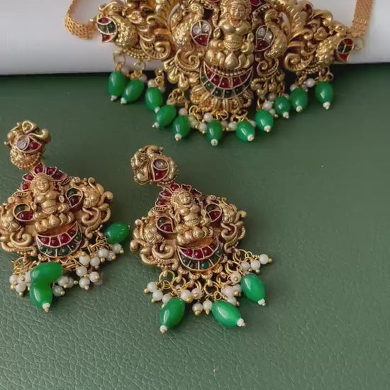 Lakshmi pendent kemp stone antique gold plated choker set with earring in green