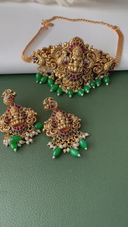 Lakshmi pendent kemp stone antique gold plated choker set with earring in green