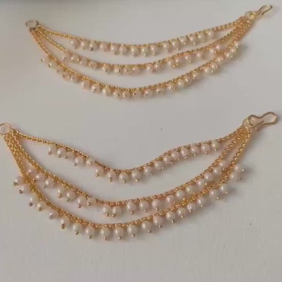 Pearl and golden three layered earchain