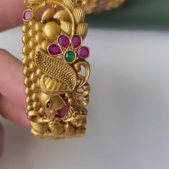 Gold plated kemp stone openable bangles with elephant flower carvings