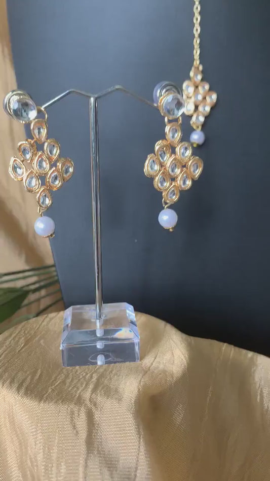 Gold plated kundan choker set with earrings and Maang tikka