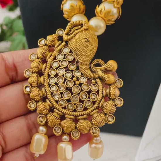 Rajawadi Polish Ganapati Pendant Necklace Set: Antique Gold Pearl Jewelry