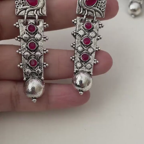 Silver lookalike peacock Oxidised earrings in Ruby and white