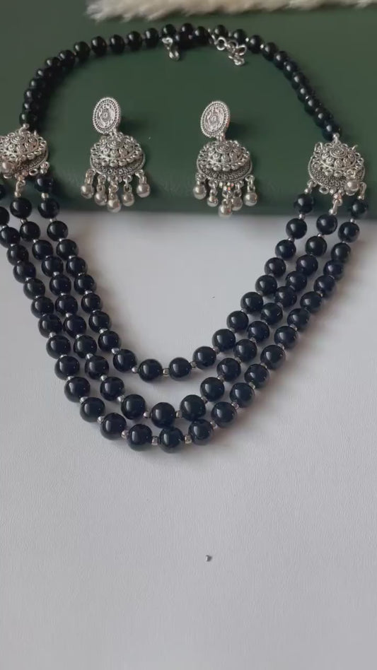 Oxidised big black beads three layered fancy necklace set with matching earrings